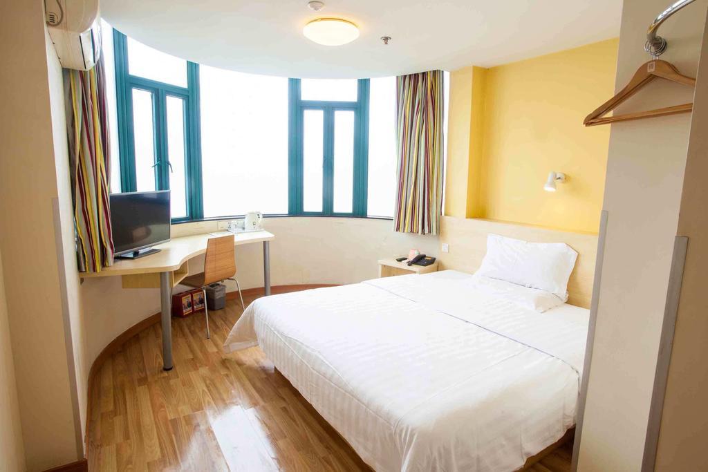 7Days Inn Luoyang Longmen Avenue Normal College Номер фото