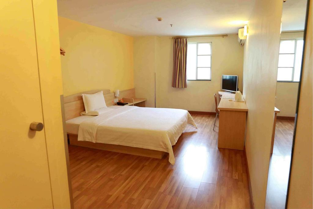 7Days Inn Luoyang Longmen Avenue Normal College Номер фото