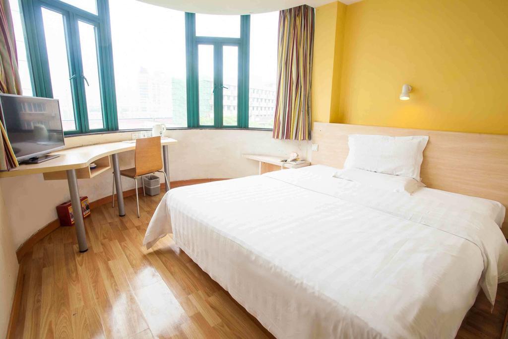 7Days Inn Luoyang Longmen Avenue Normal College Номер фото