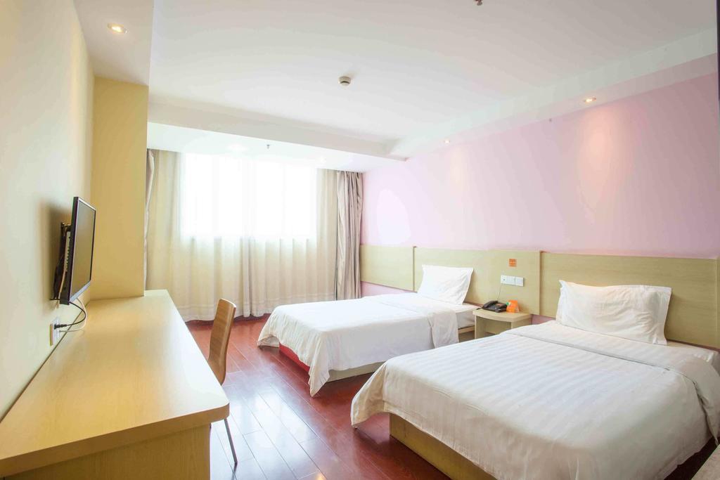 7Days Inn Luoyang Longmen Avenue Normal College Номер фото