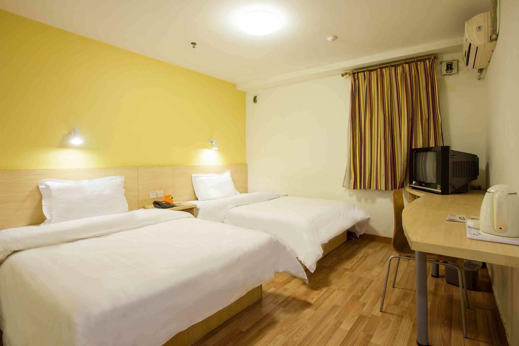 7Days Inn Luoyang Longmen Avenue Normal College Номер фото