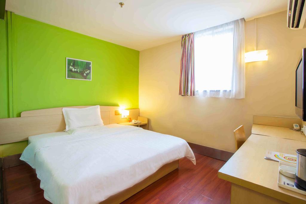 7Days Inn Luoyang Longmen Avenue Normal College Номер фото